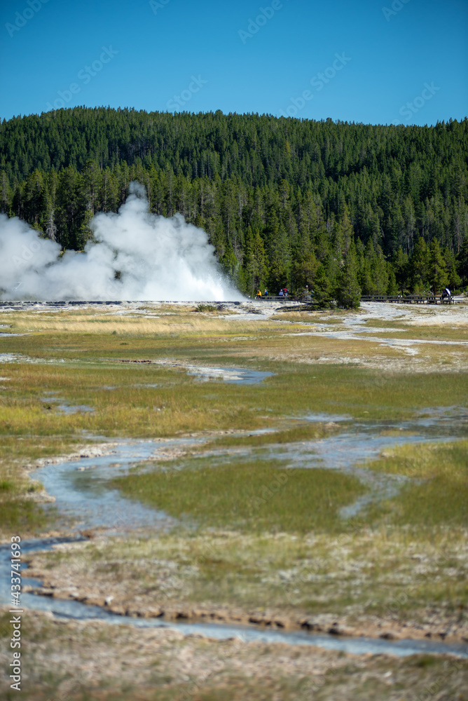 Eruption of Old Faithful geyser at Yellowstone Nationl park Eruption of Old Faithful geyser at Yellowstone Nationl park