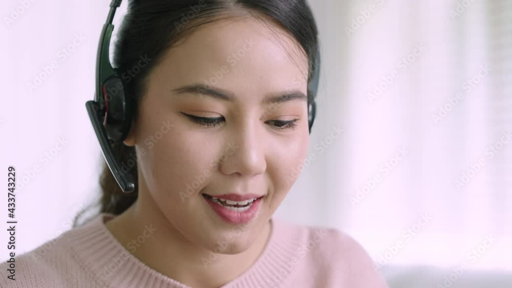 Young asian woman employee work from home using computer notebook videocall meeting conference angry annoy with low poor unreliable internet wifi connection problem issue outage. Young asian woman employee work from home using computer notebook videocall meeting conference angry annoy with low poor unreliable internet wifi connection problem issue outage.