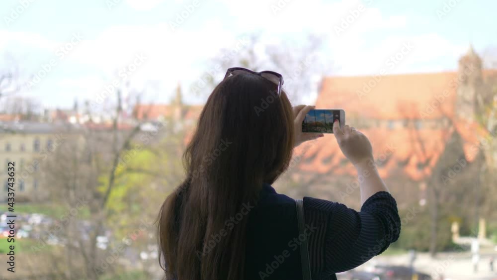 Brunette woman taking picture in 4k slow motion 60fps Brunette woman taking picture in 4k slow motion 60fps