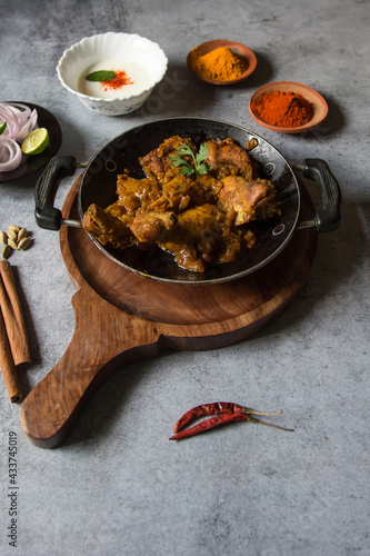 Chicken kasha or chicken cooked with Indian spices, onion and ginger garlic paste and yogurt. A spicy semi dry food item.