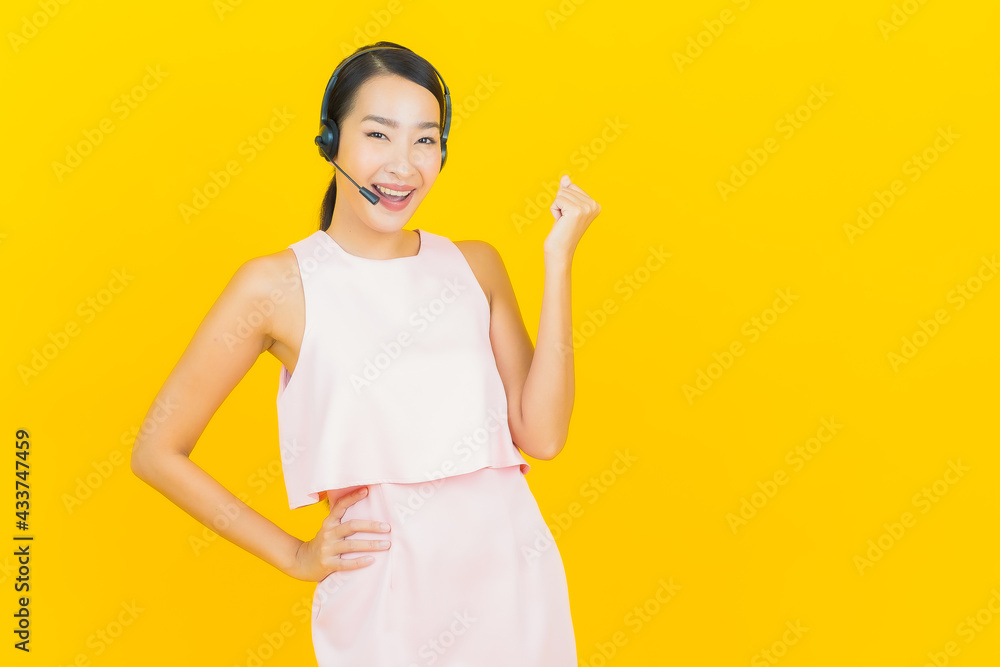 Portrait beautiful young asian woman with call center customer care service center Portrait beautiful young asian woman with call center customer care service center