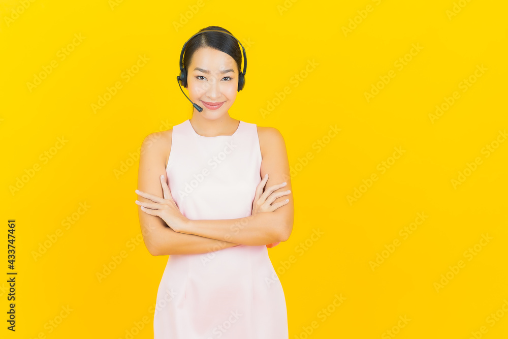 Portrait beautiful young asian woman with call center customer care service center Portrait beautiful young asian woman with call center customer care service center