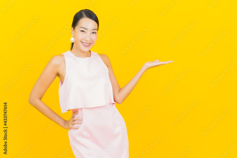 Portrait beautiful young asian woman smile with action Portrait beautiful young asian woman smile with action
