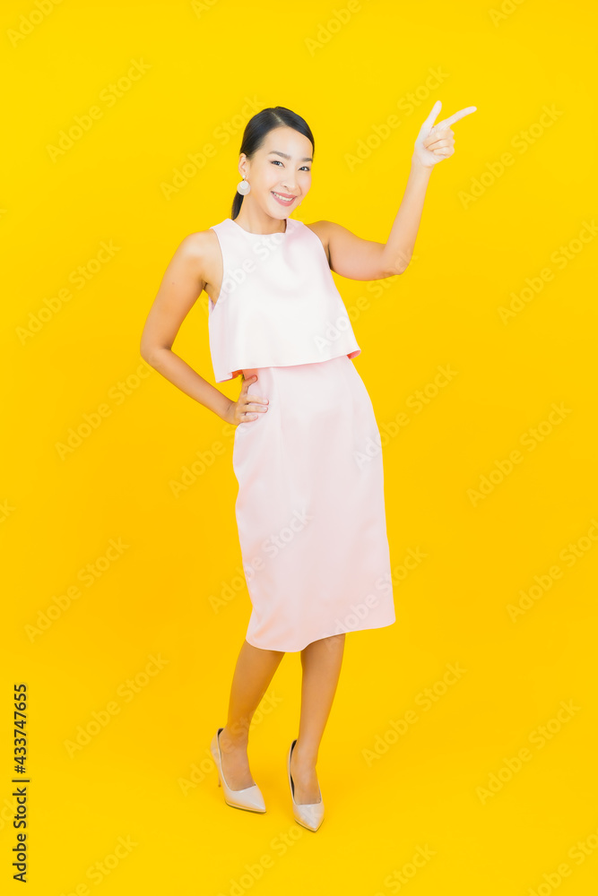 Portrait beautiful young asian woman smile with action Portrait beautiful young asian woman smile with action