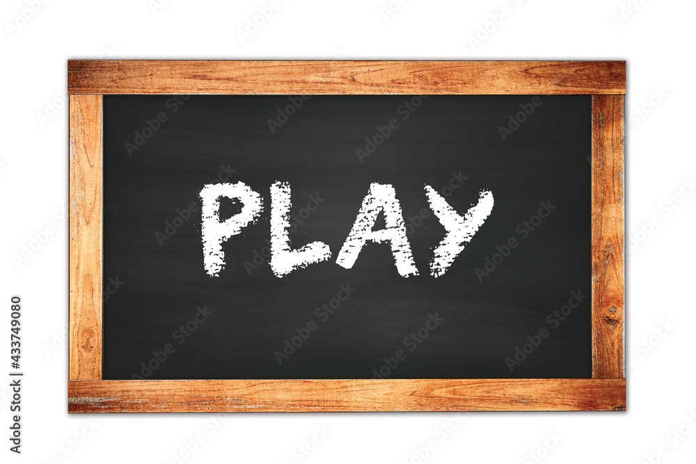 PLAY text written on wooden frame school blackboard. PLAY text written on wooden frame school blackboard.