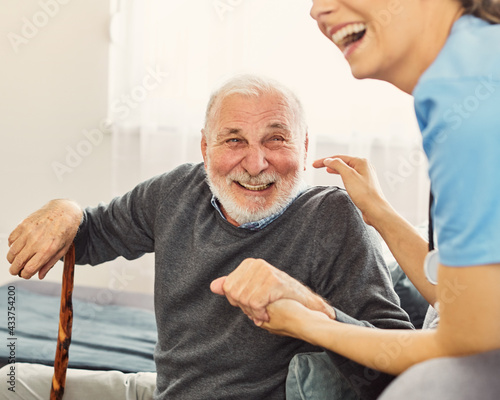 Obraz na plátne nurse doctor senior care caregiver help assistence retirement home nursing elder