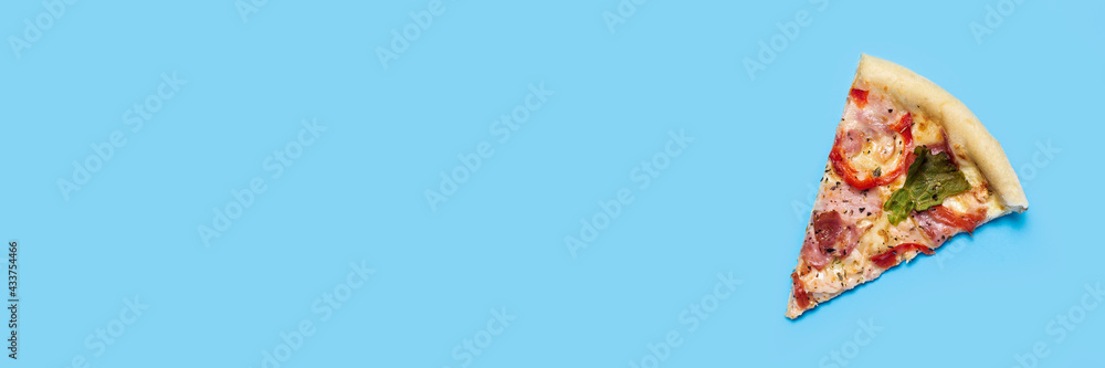 slice of hot fresh pizza lies on a blue background. Top view, flat lay. Banner