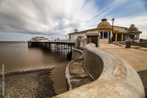 Cromer pier (Norfolk, United Kingdom) in windy morning photo