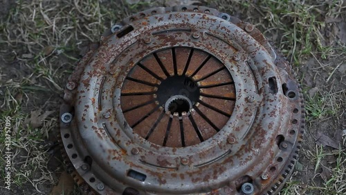 Old car spare part, rusty clutch kit. Close-up, industry photo