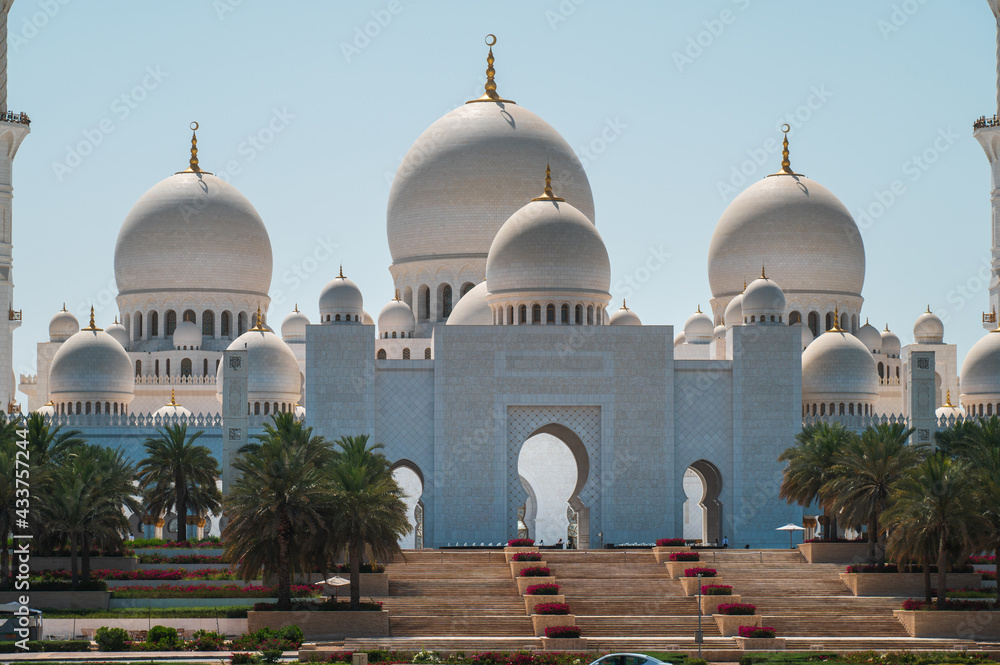 Closeup view of Sheikh Zayed Grand Mosque in Abu Dhabi, UAE on a sunny day.