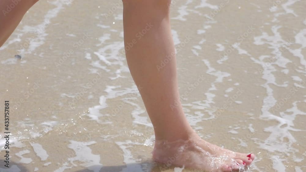 Woman walks in the ocean water in slow motion 120fps
Woman walks in the ocean water in slow motion 120fps