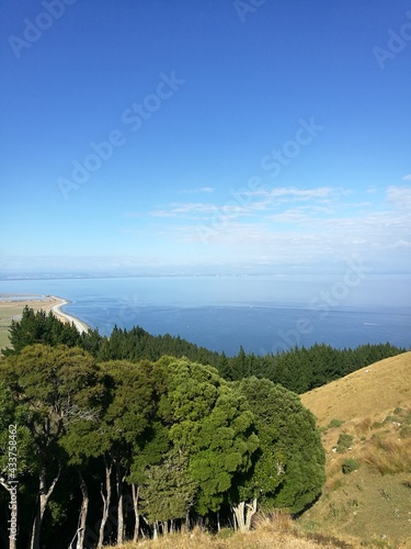 hiking trail from Glenduan to Cable bay, walkaway, hike with view on beautiful landscape and the sea, New Zealand, South Island Beschreibung photo