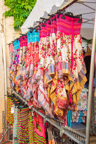 Dresses on a Provencal market, France © Pixavril