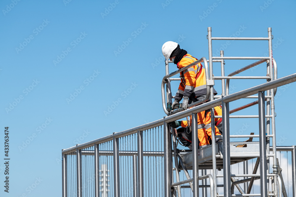 Workers working on scaffolding