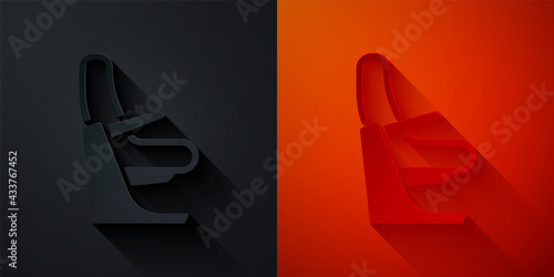 Paper cut Airplane seat icon isolated on black and red background. Paper art style. Vector