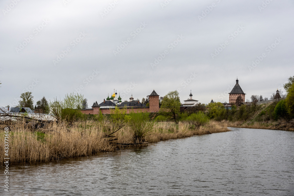 monasteries and fortresses of old Suzdal against the backdrop of a green river monasteries and fortresses of old Suzdal against the backdrop of a green river