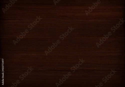 Dark brown wood texture with minimal grain