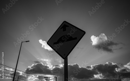 Black and white road sign
