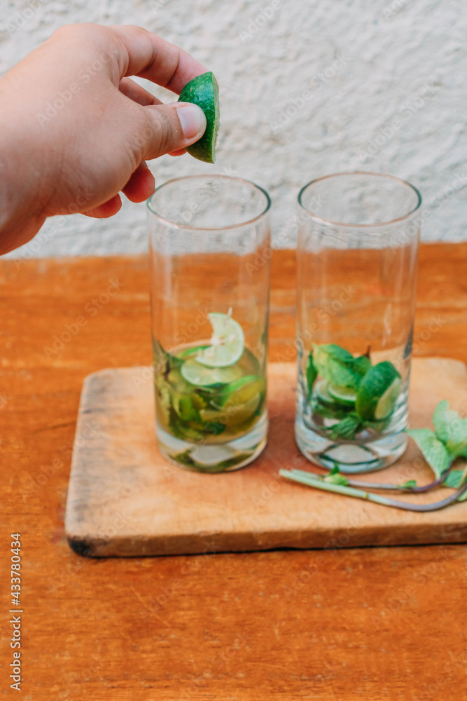 Fototapeta premium Preparing a delicious mojito at home