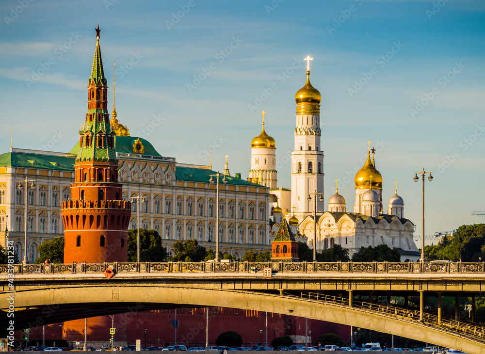 Russia, stunning skyline of Moscow with Kremlin towers over Moskva river bridge
