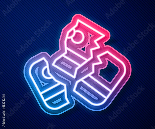 Glowing neon line Scissors cutting a credit card icon isolated on blue background. Online payment. Cash withdrawal. Financial operations. Shopping sign. Vector