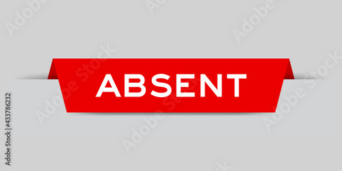 Red color inserted label with word absent on gray background