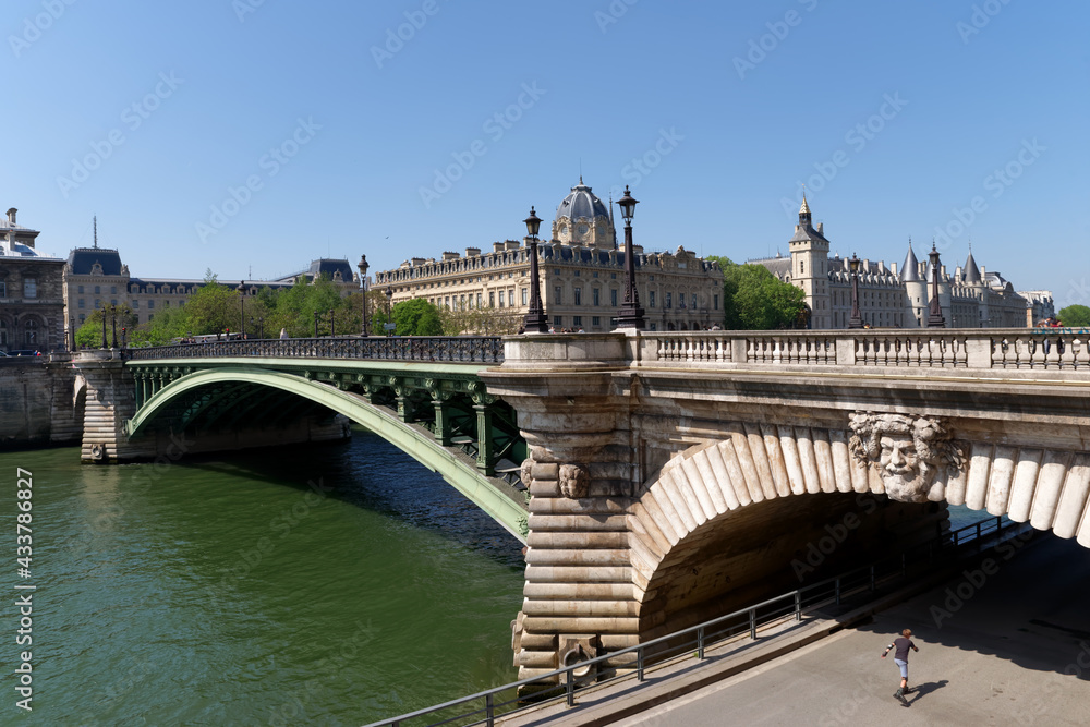 Notre-Dame bridge and Seine river quay in the 4th arrondissement of Paris