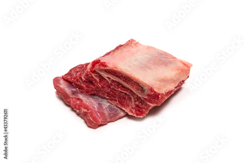 Raw beef ribs isolated on white background.