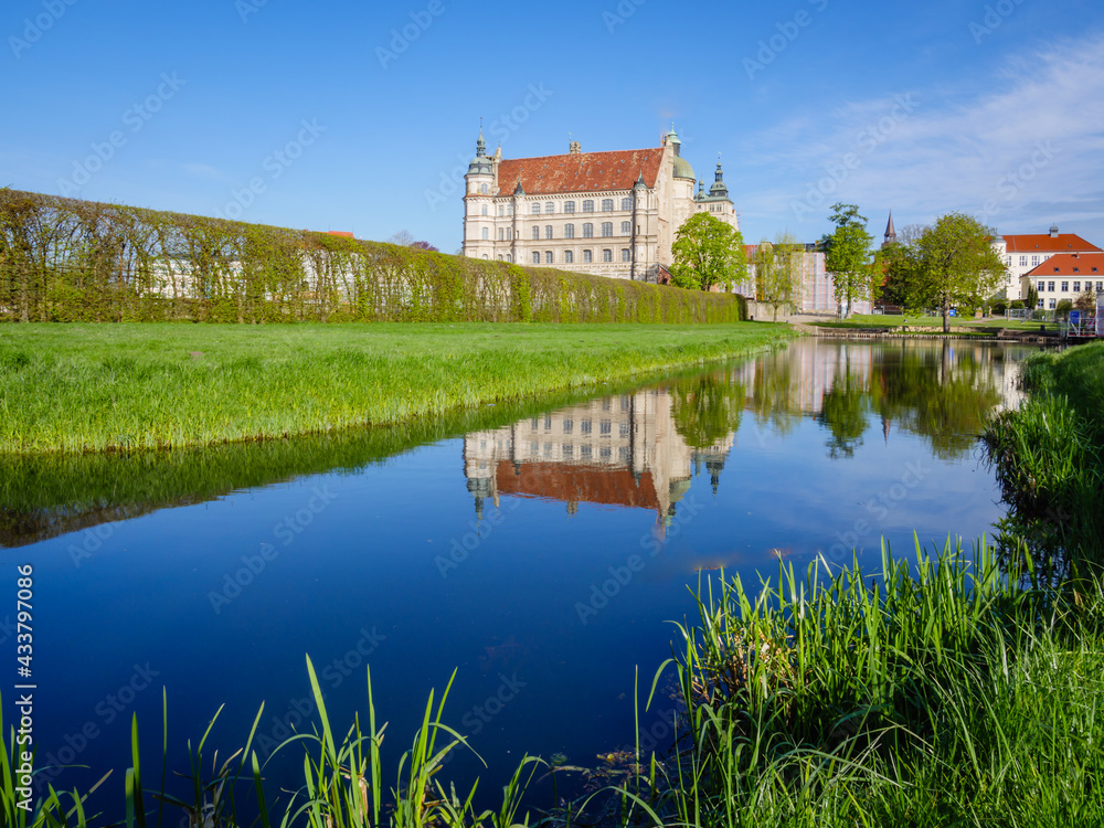 Güstrow Castle with a pond in Mecklenburg-Western Pomerania Güstrow Castle with a pond in Mecklenburg-Western Pomerania