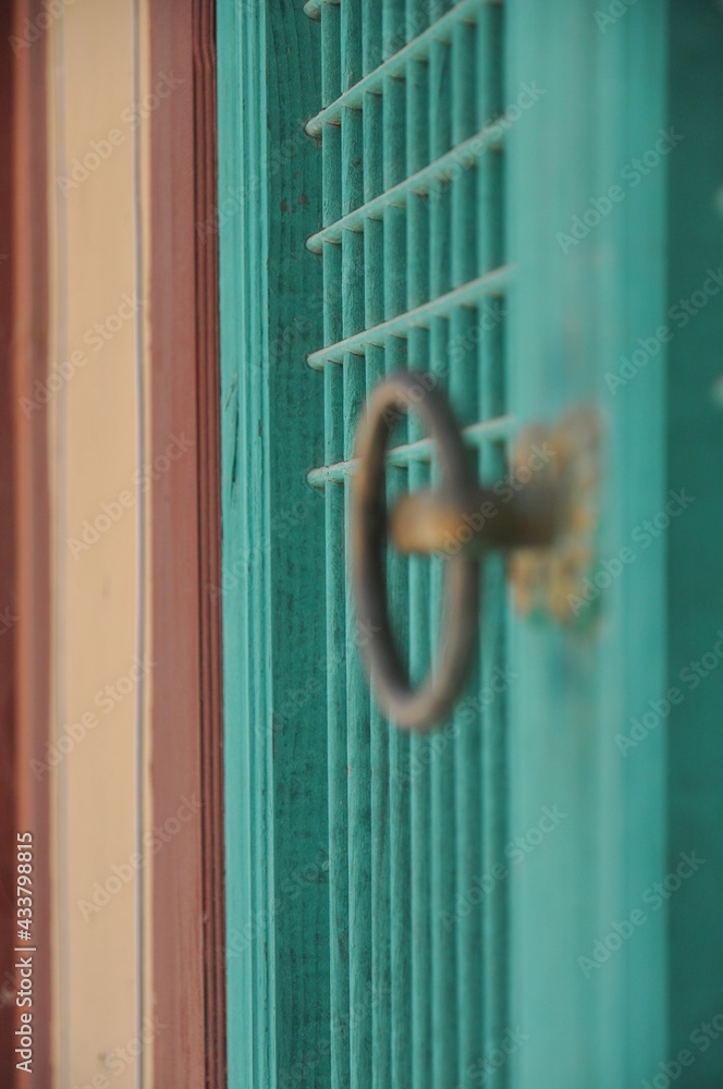 Gugwangnu Pavilion door handle close-up at Haeinsa Temple, Mount Gaya, Gayasan National Park, South Korea. Gugwangnu Pavilion door handle close-up at Haeinsa Temple, Mount Gaya, Gayasan National Park, South Korea.
