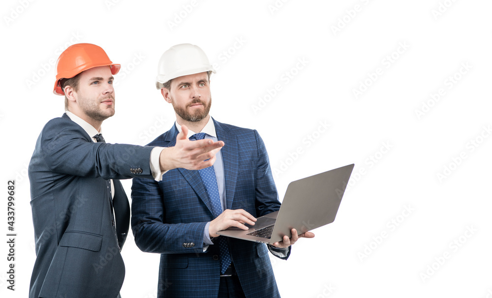 two engineers in suit and protective helmet use laptop isolated on white copy space, safety business two engineers in suit and protective helmet use laptop isolated on white copy space, safety business