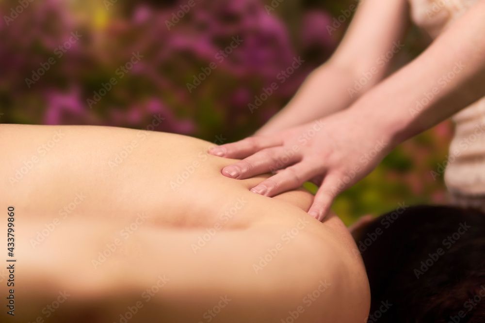 hands of a professional masseuse while working close-up hands of a professional masseuse while working close-up