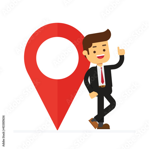 Businessman stand next to large map pointer