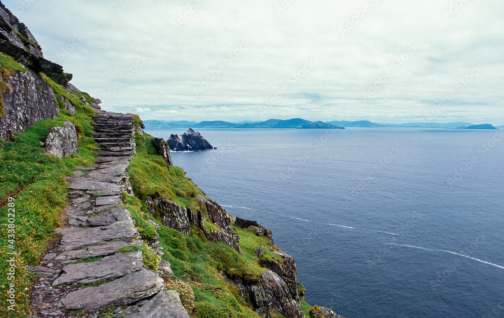 Skellig islands, Skellig Michael is a twin-pinnacled crag 11.6 kilometres west of the Iveragh Peninsula in County Kerry, Ireland.