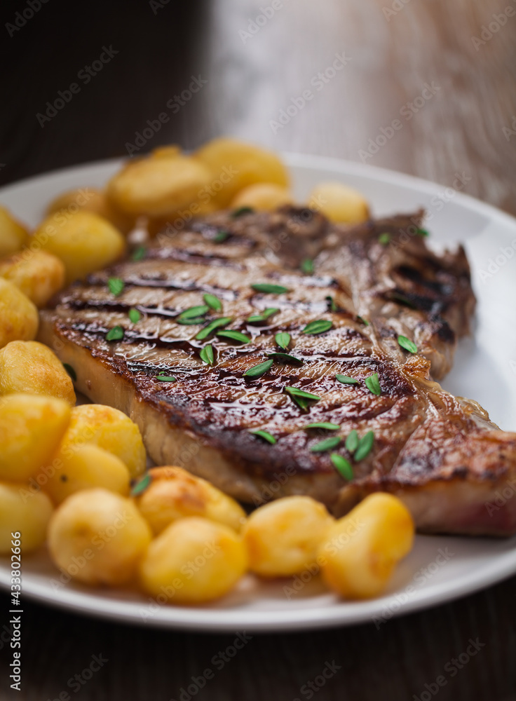 Grilled Beefsteak with Baby Roasted Potatoes. High quality photo.