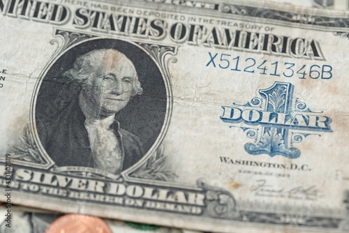 1923 dollar banknote. Old US dollar money with George Washington portrait. Blue 1 dollar writing.