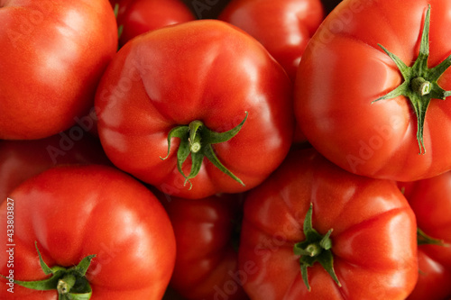 Raspberry tomatoes of Polish production close-up. © Liliia