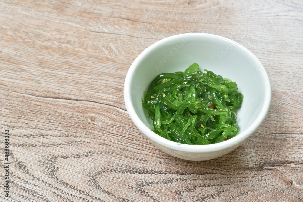 Chukka wakame or seaweed in sesame oil Japanese salad in cup Chukka wakame or seaweed in sesame oil Japanese salad in cup