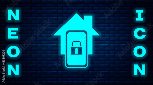 Glowing neon Mobile phone with smart home icon isolated on brick wall background. Remote control. Vector