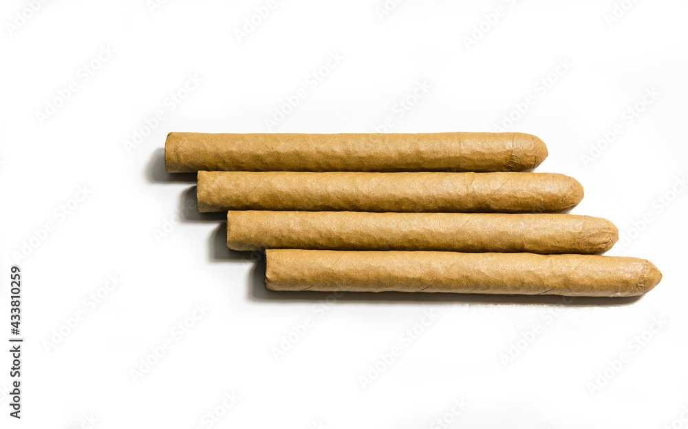 Cigars on a white background, soft focus image.