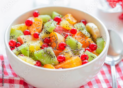 .Diet, healthy fruit salad in a white bowl-healthy Breakfast, weight loss concept.