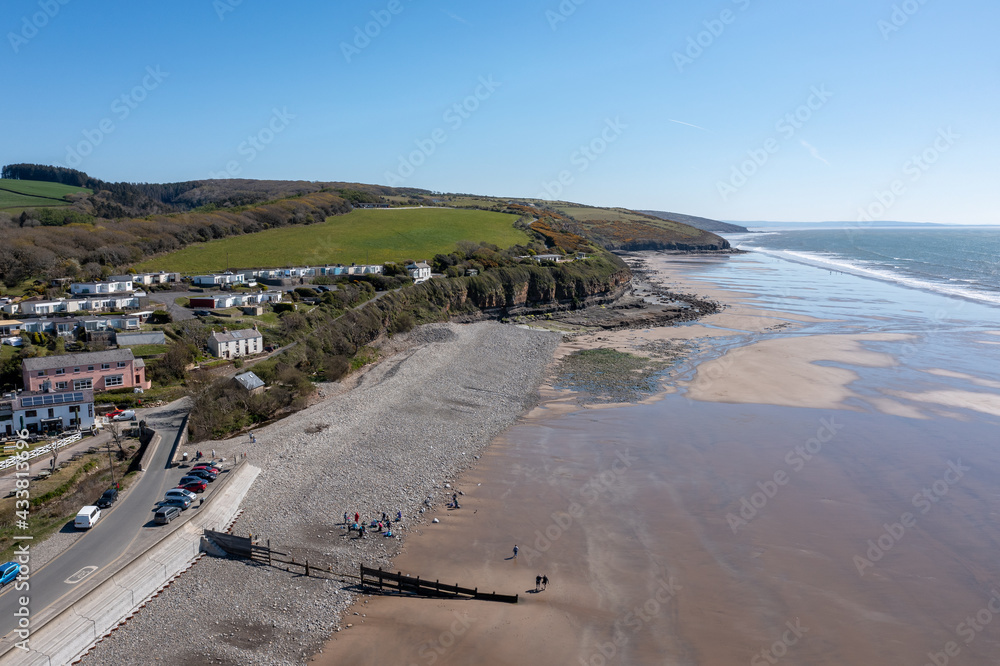 View of Amroth Beach on the Pembrokeshire coast in winter with very few people. It is more popular in the summer with families enjoying the sea and sand.