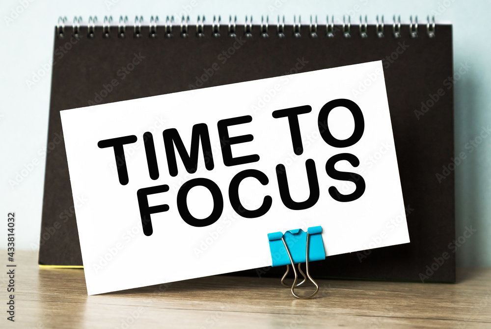 Business concept. List with text sheet TIME TO FOCUS of paper for notes Business concept. List with text sheet TIME TO FOCUS of paper for notes