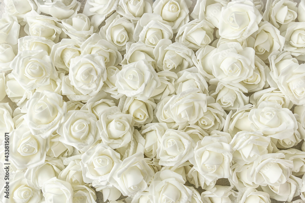 background of many fake white roses. Top view. background of many fake white roses. Top view.