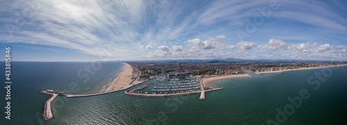 Panoramic view of Rimini, its sea, its beaches and its port on the Romagna Riviera in post-pandemic italy