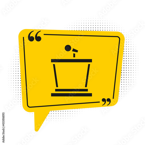 Black Stage stand or debate podium rostrum icon isolated on white background. Conference speech tribune. Yellow speech bubble symbol. Vector