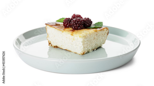 Plate with piece of cottage cheese casserole on white background