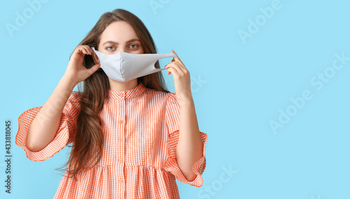 Young woman wearing medical...