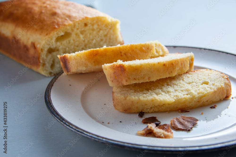 sliced simple home made yogourt cake , home cooking . sliced simple home made yogourt cake , home cooking .
