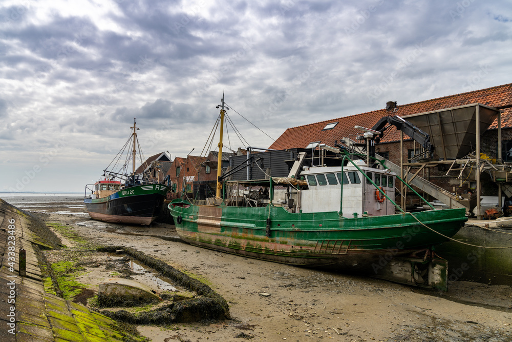 fishing boats in the port of Yerseke at low tide